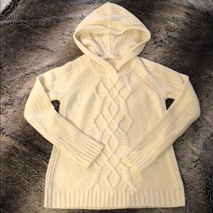 Athleta cream color cable knit sweater.